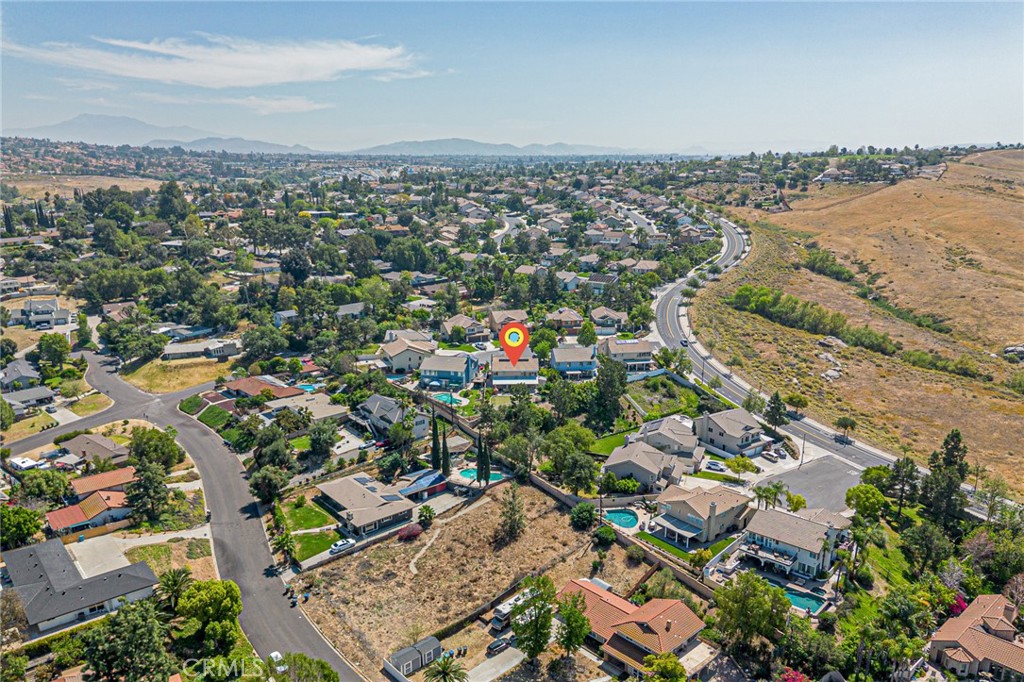 5423 Canmore Court Riverside, CA 92507 - Photo 58 of 58 an aerial view of city and lake