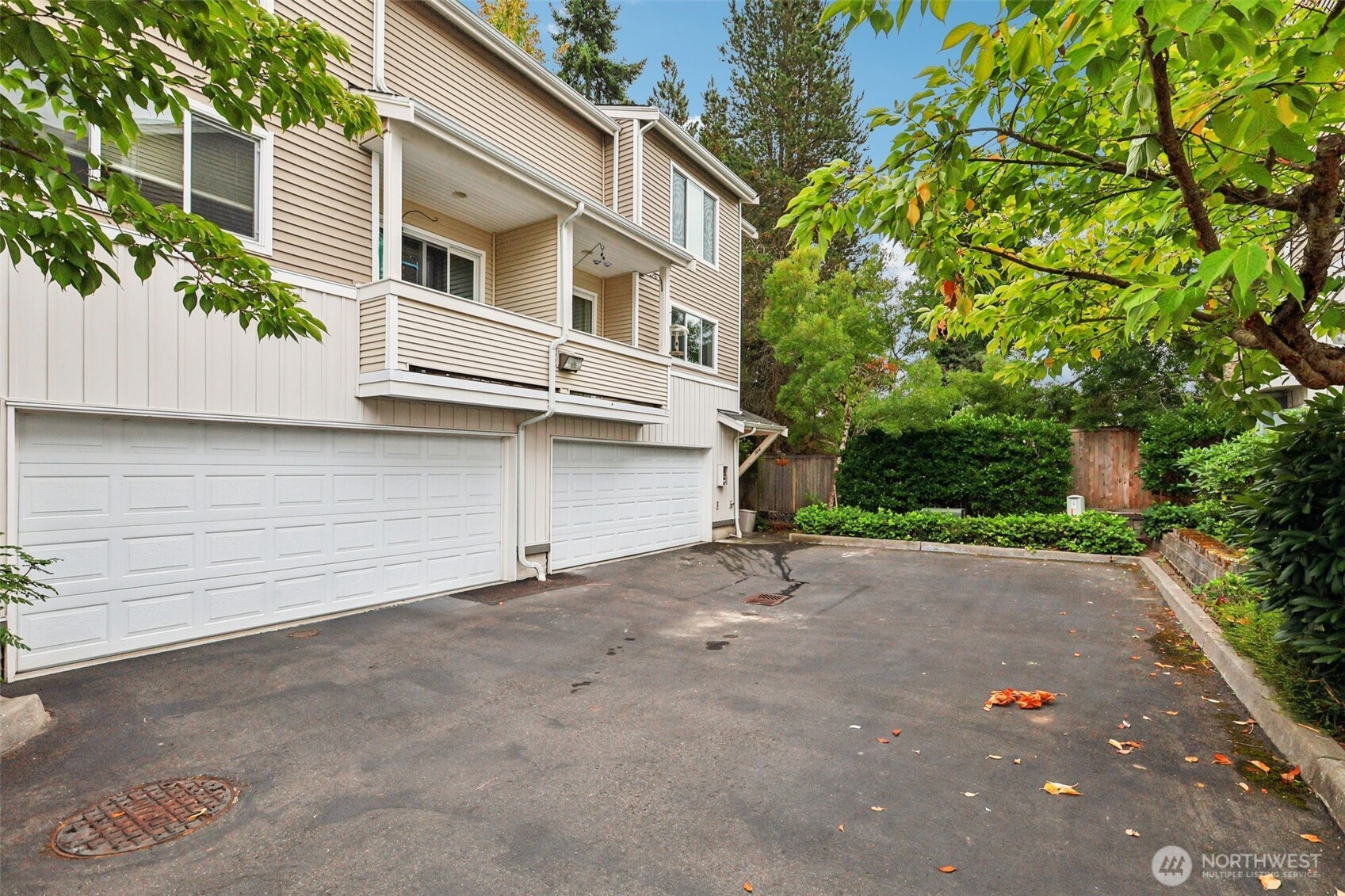 5502 240th Street Southwest, Unit C304 Mountlake Terrace, WA 98043 - Photo 2 of 30 front view of a house with a street
