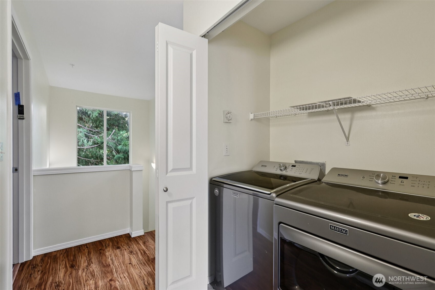 5502 240th Street Southwest, Unit C304 Mountlake Terrace, WA 98043 - Photo 21 of 30 a utility room with washer and dryer