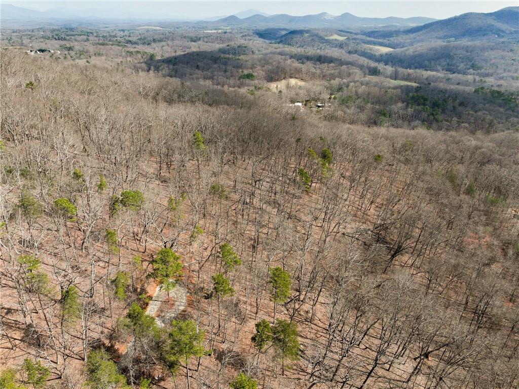 Lot 7 Mount Mincie Road Murrayville, GA 30564 - Photo 7 of 16 a view of a dry field with mountains in the background