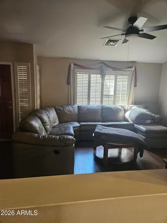 a view of a garage with a car parked in it