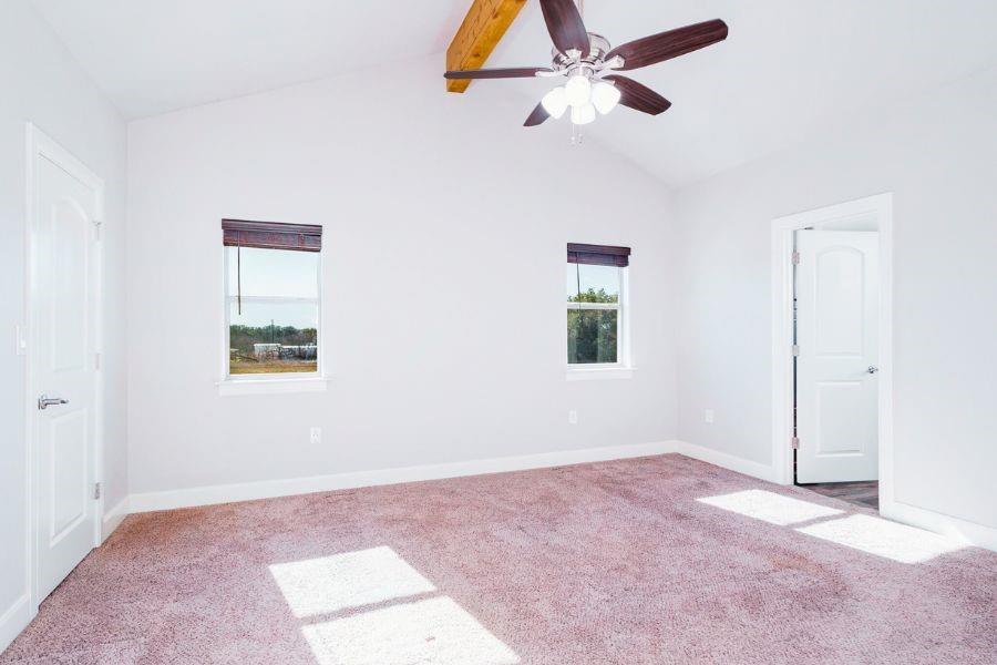 4319 County Road 337 Early, TX 76802 - Photo 11 of 31 Spacious bedroom with view of the backyard