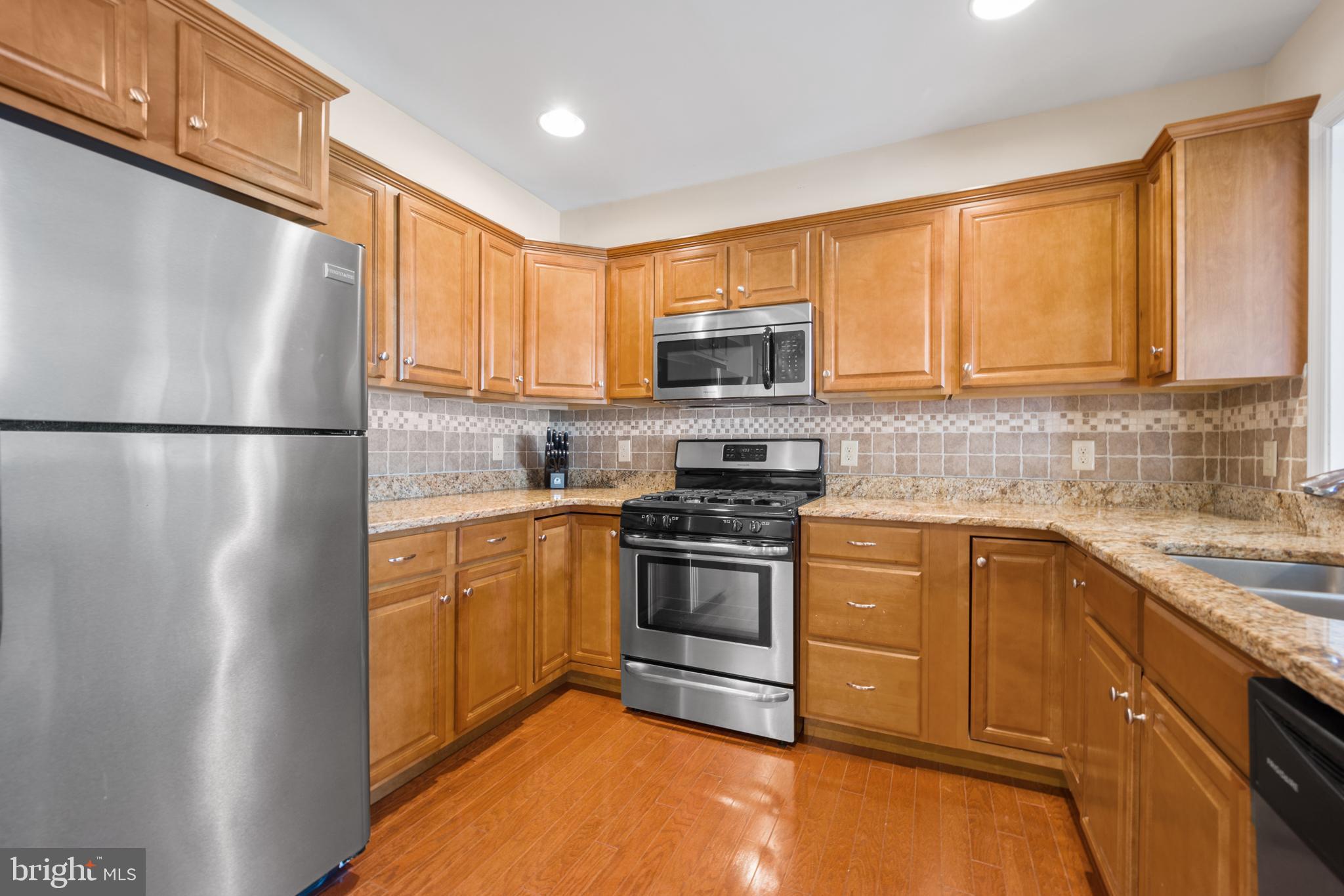 34 Tweed Road Levittown, PA 19056 - Photo 13 of 36 Kitchen with gas range and dishwasher