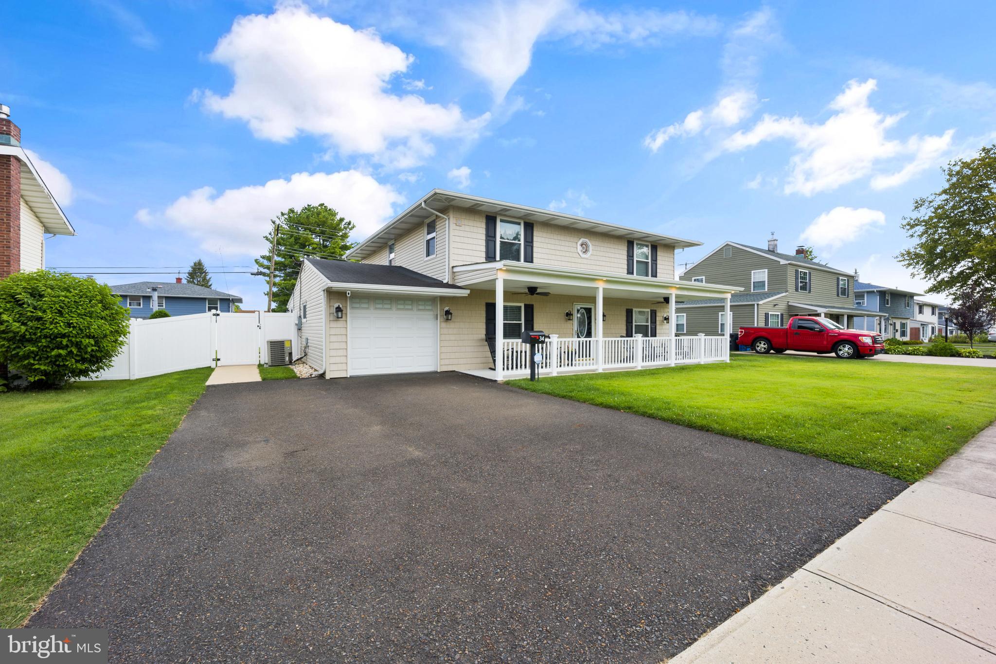 34 Tweed Road Levittown, PA 19056 - Photo 18 of 36 One car garage with plenty of parking out front
