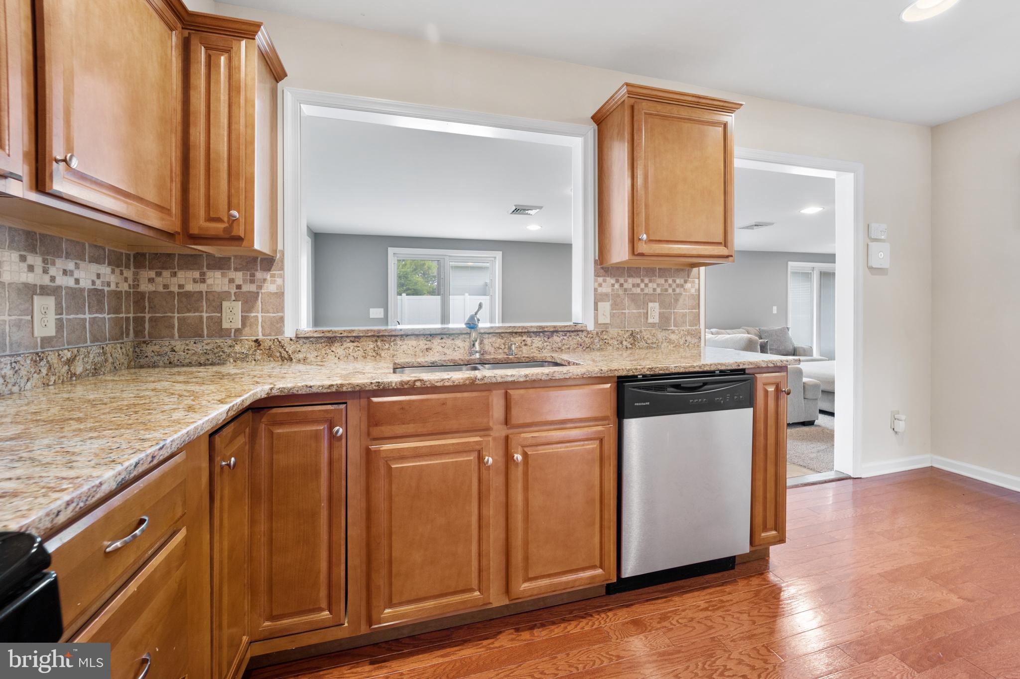 34 Tweed Road Levittown, PA 19056 - Photo 6 of 36 Kitchen Spills into Dining area and Family Room