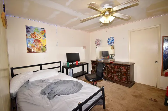 a kitchen with a table and chairs in it