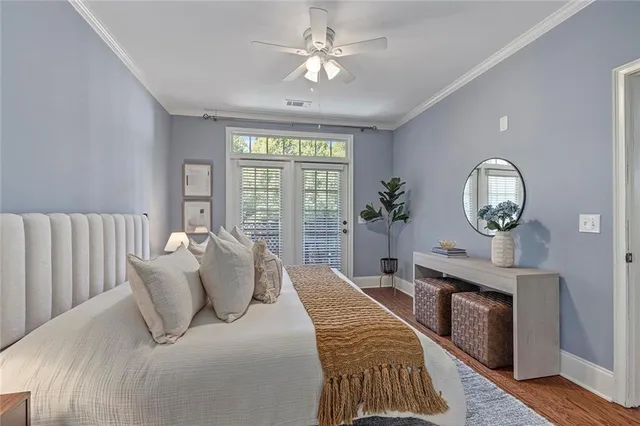 a bathroom with a granite countertop sink a mirror and vanity