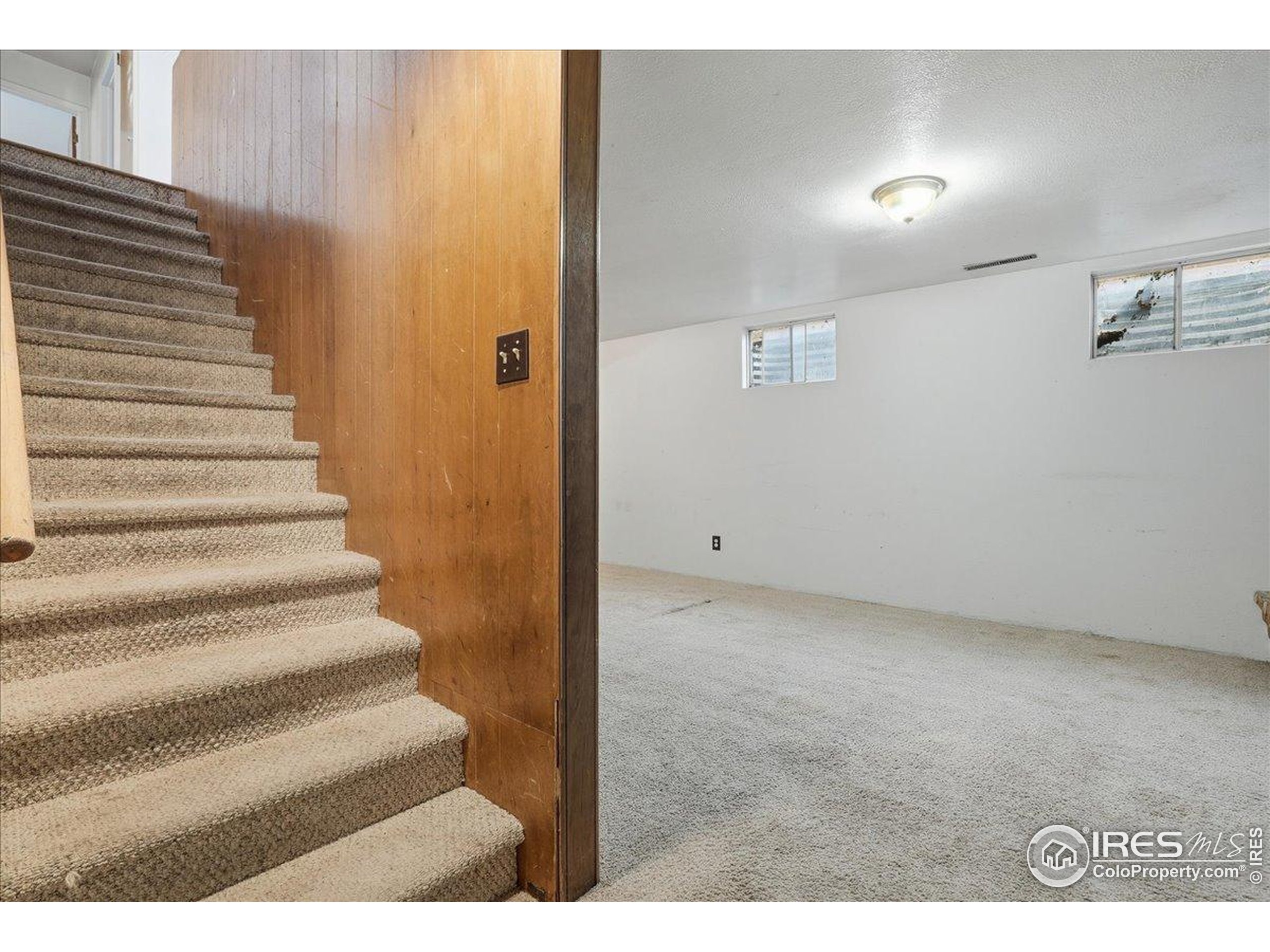1113 Fairview Drive Fort Collins, CO 80521 - Photo 19 of 35 a view of entryway with wooden floor