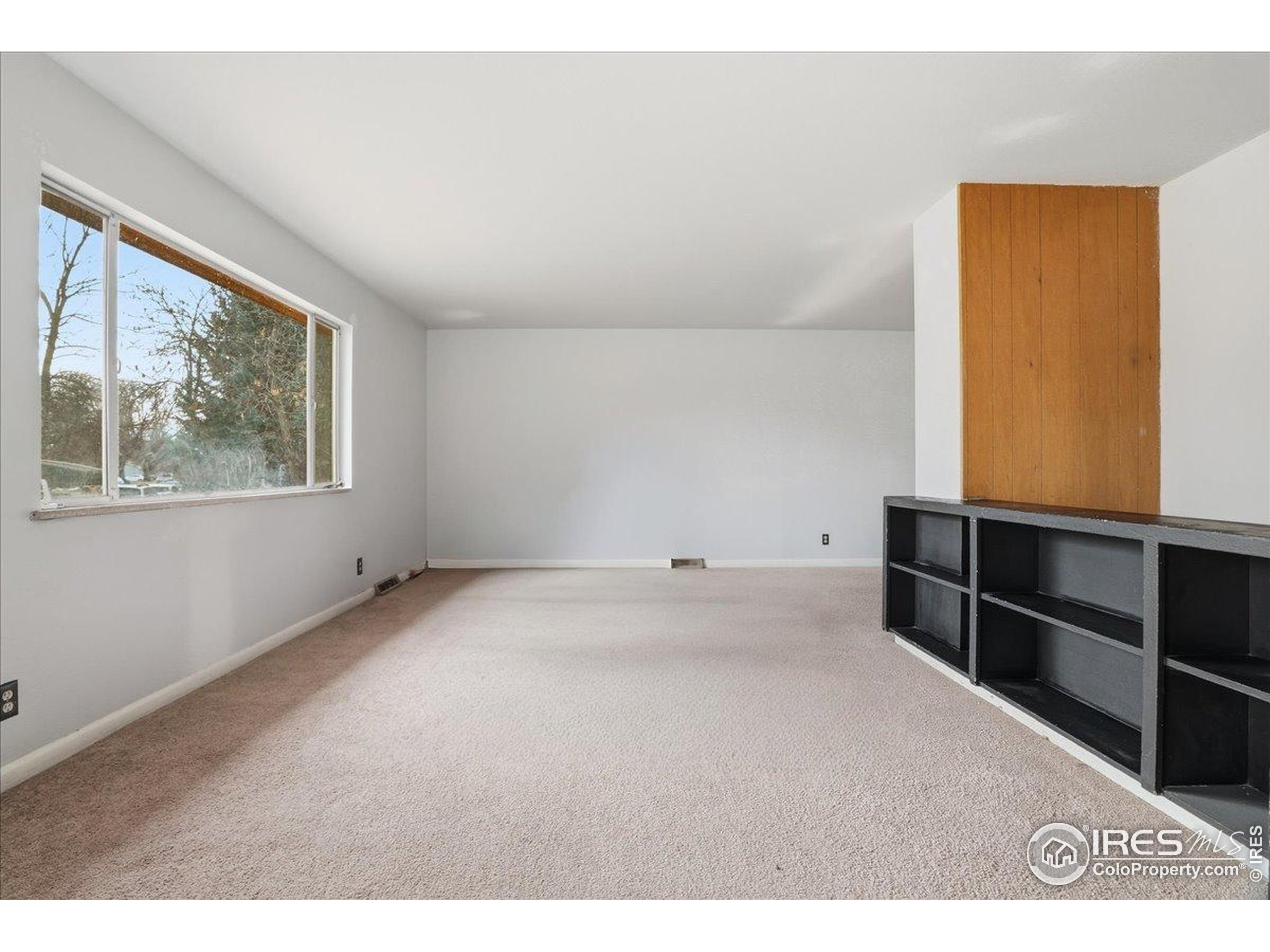 1113 Fairview Drive Fort Collins, CO 80521 - Photo 3 of 35 a view of an empty room with a window