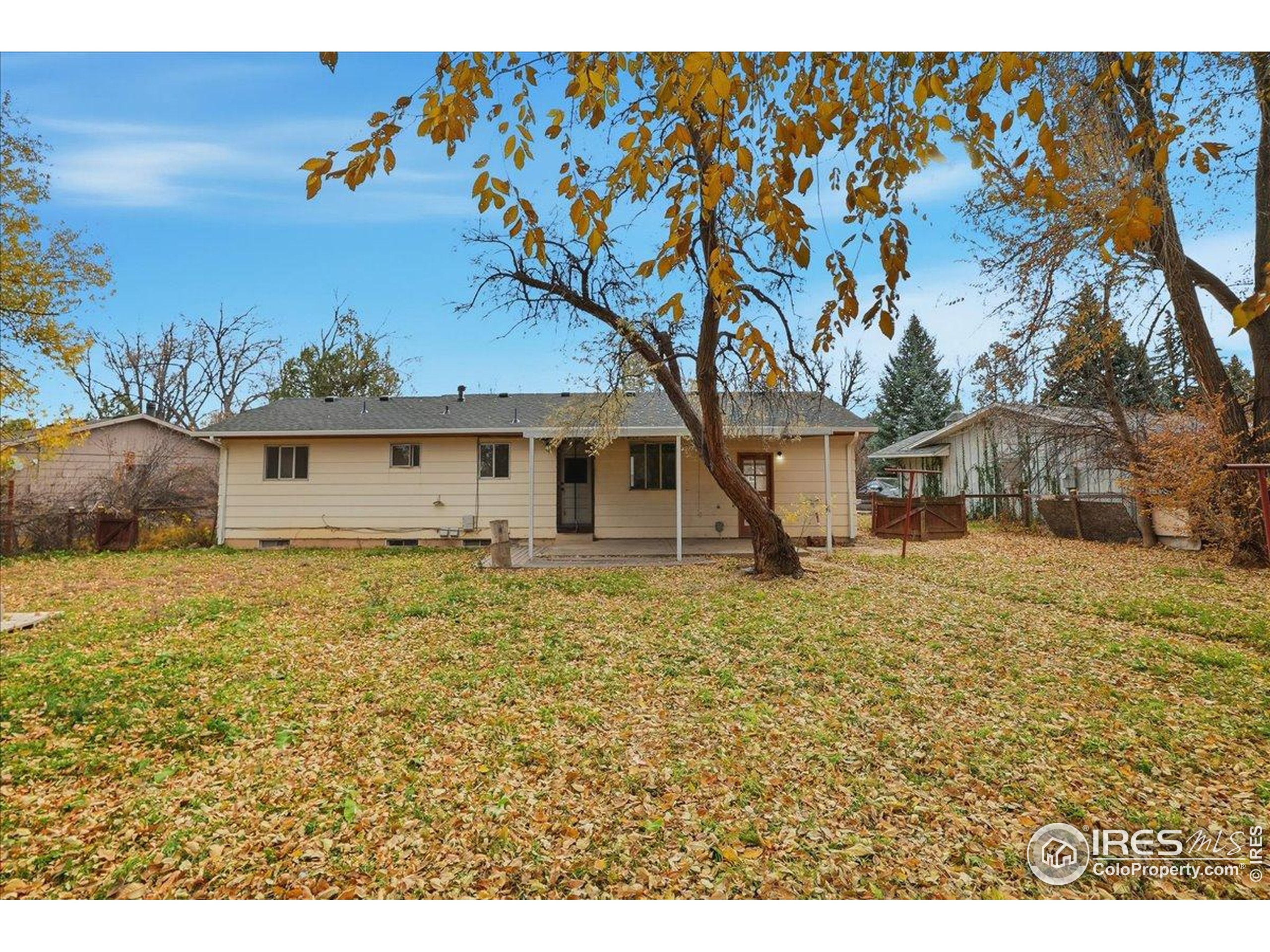 1113 Fairview Drive Fort Collins, CO 80521 - Photo 31 of 35 a view of a house with a tree in the background