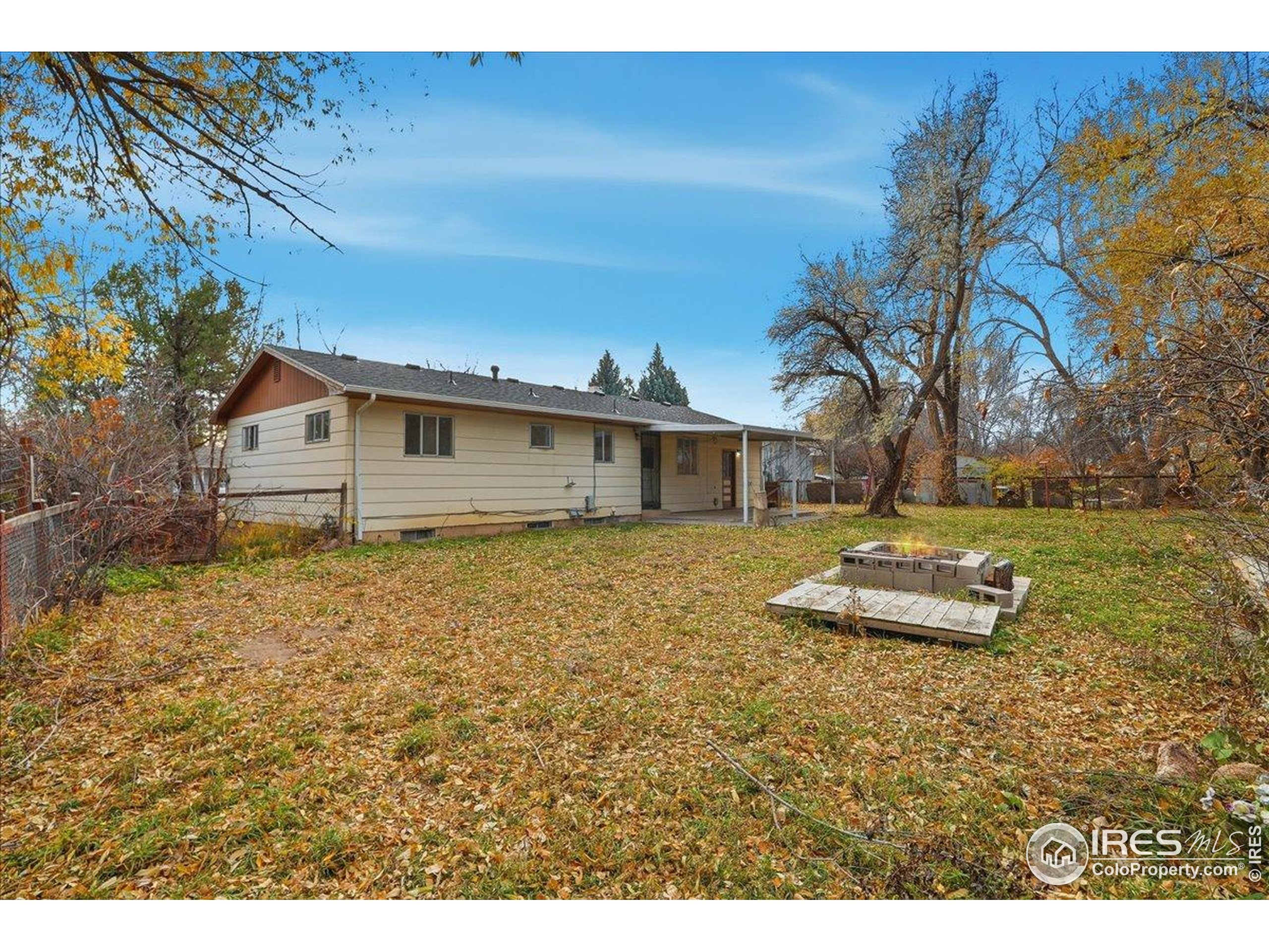 1113 Fairview Drive Fort Collins, CO 80521 - Photo 32 of 35 a front view of a house with a yard