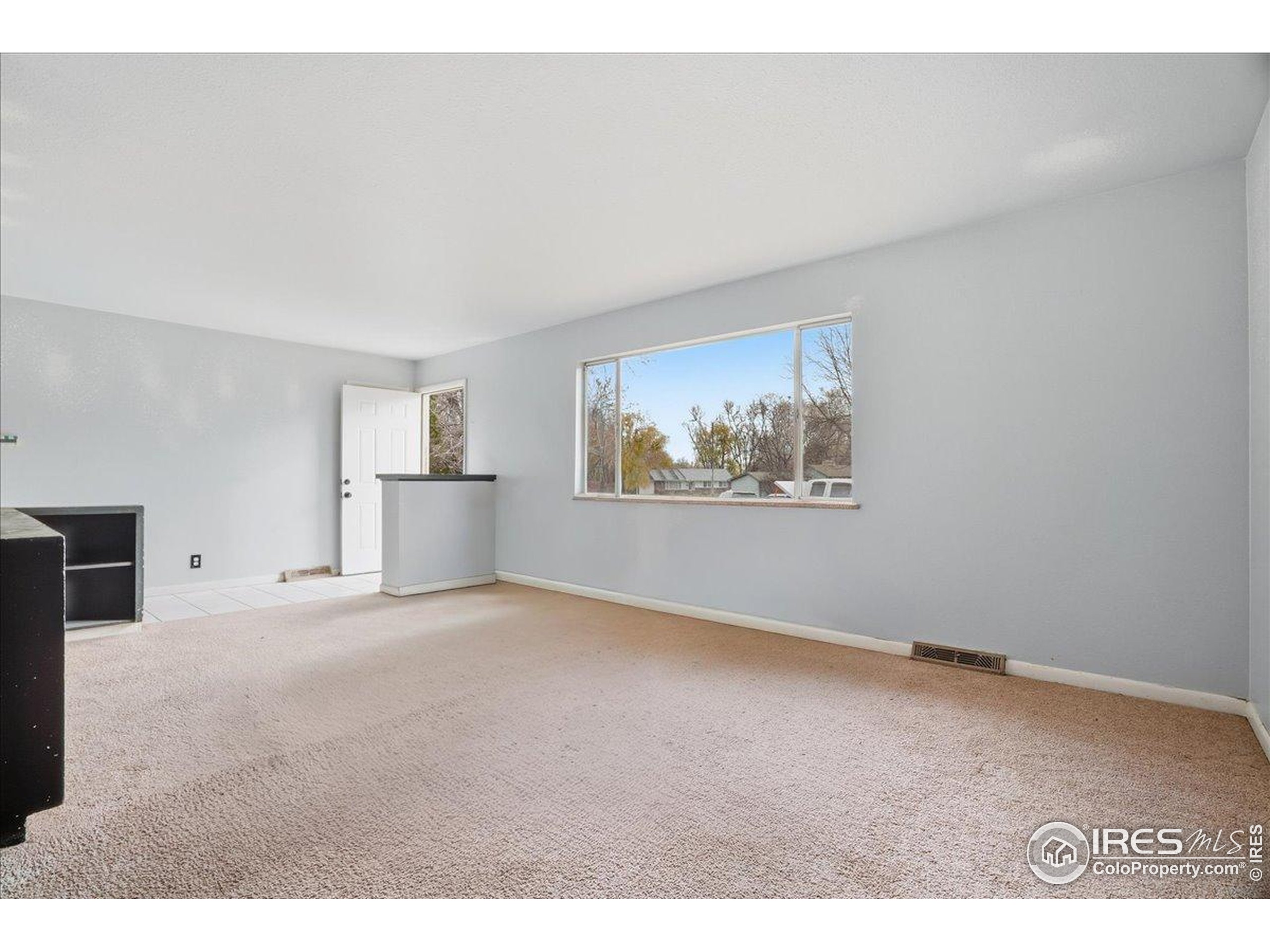 1113 Fairview Drive Fort Collins, CO 80521 - Photo 4 of 35 a view of empty room with window