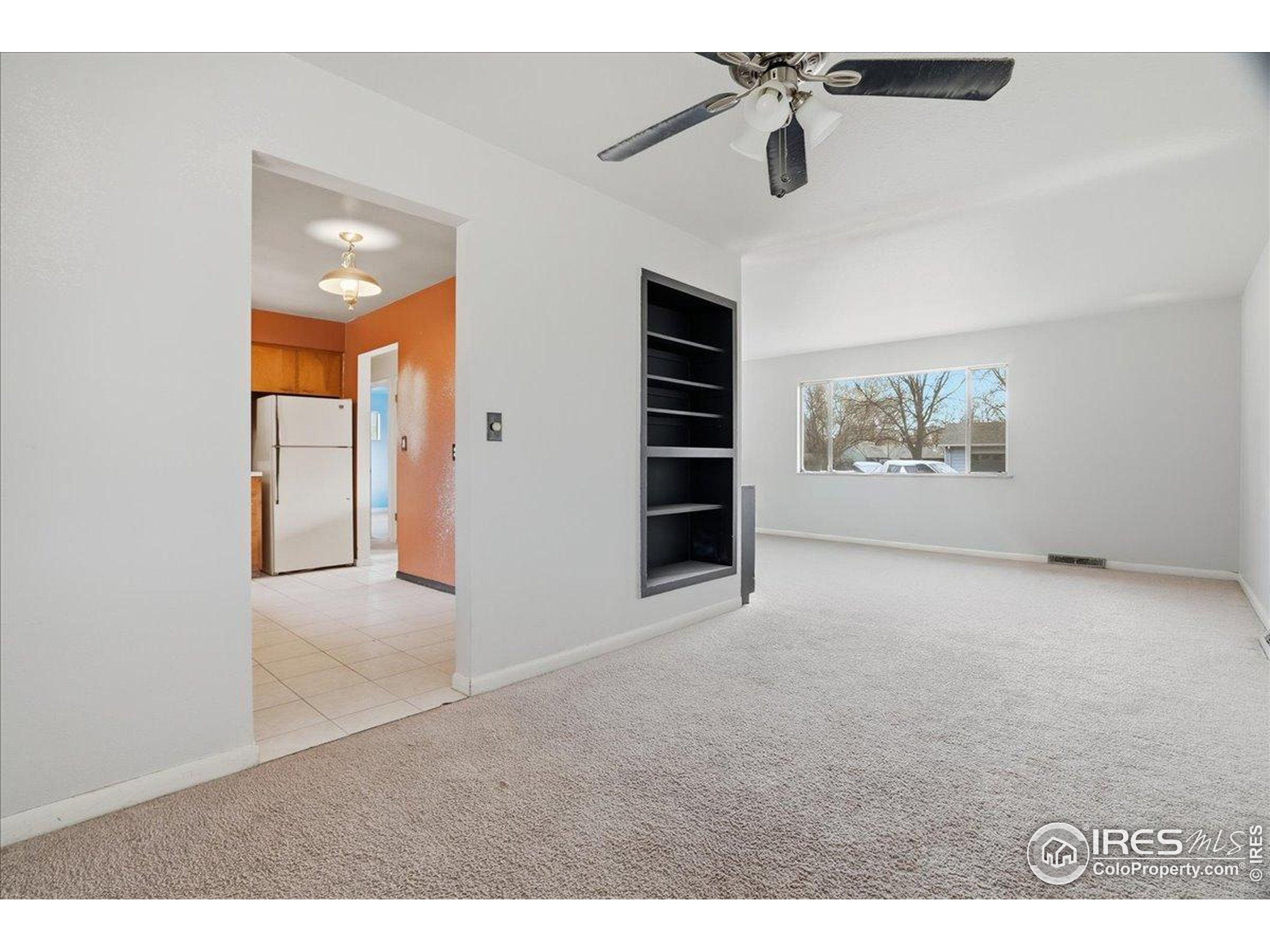 1113 Fairview Drive Fort Collins, CO 80521 - Photo 7 of 35 a view of an empty room with a window
