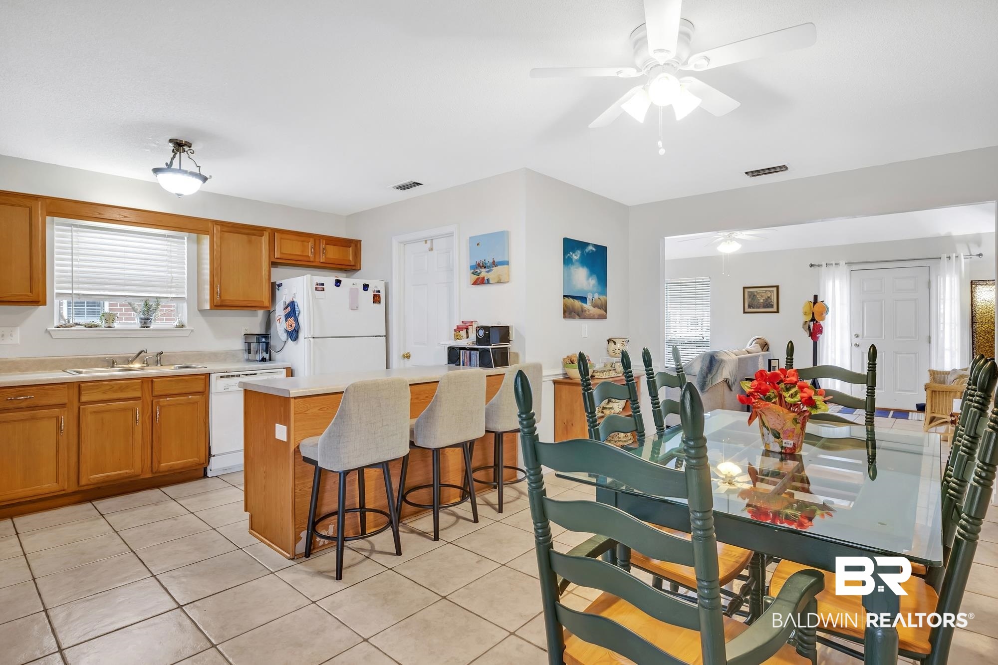 105 Cluster Oaks Court Foley, AL 36535 - Photo 25 of 26 Dining space with light tile patterned floors and a ceiling fan
