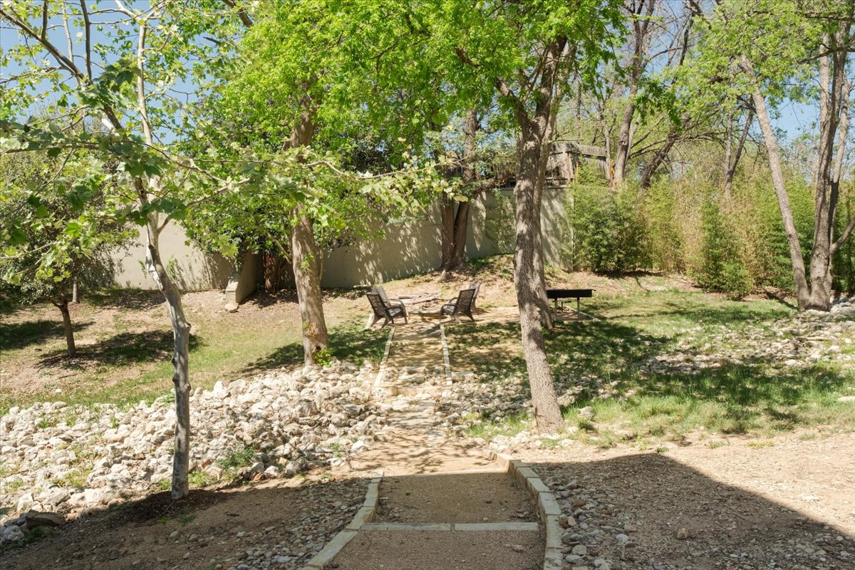3700 Clawson Road, Unit 301 Austin, TX 78704 - Photo 30 of 35 View of the grounds from rear windows with one of two fire pits
