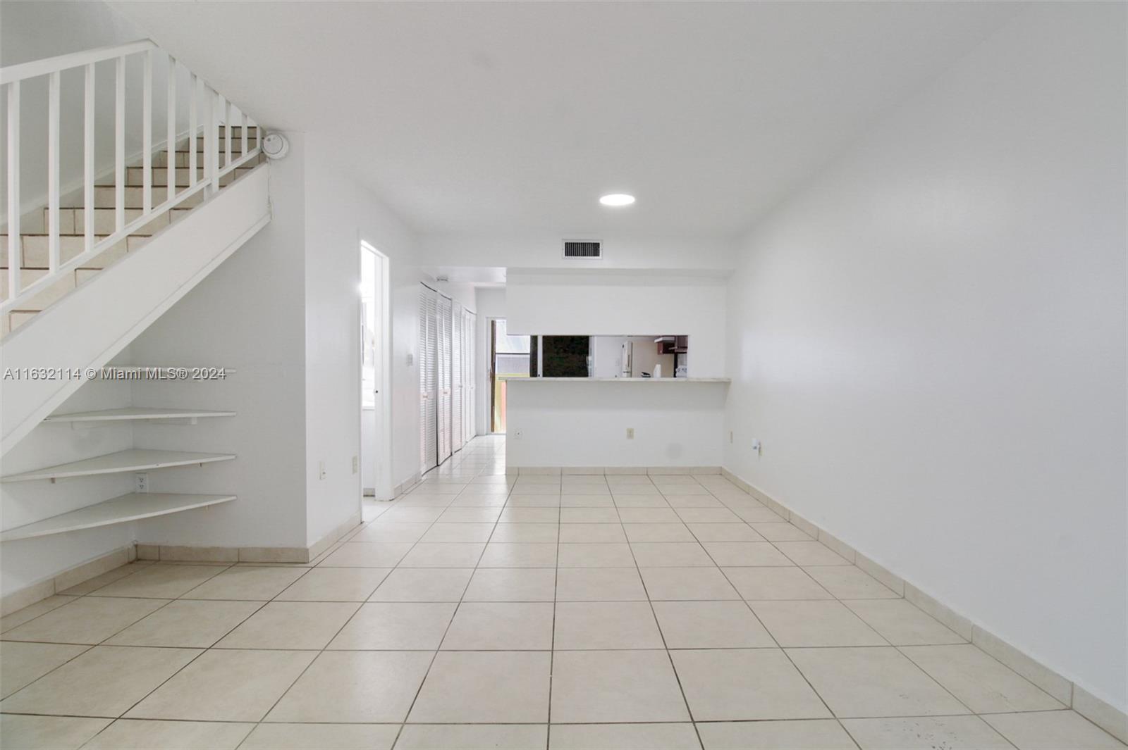 937 Michigan Avenue, Unit 4 Miami Beach, FL 33139 - Photo 11 of 20 a view of a livingroom with an empty space and a fireplace