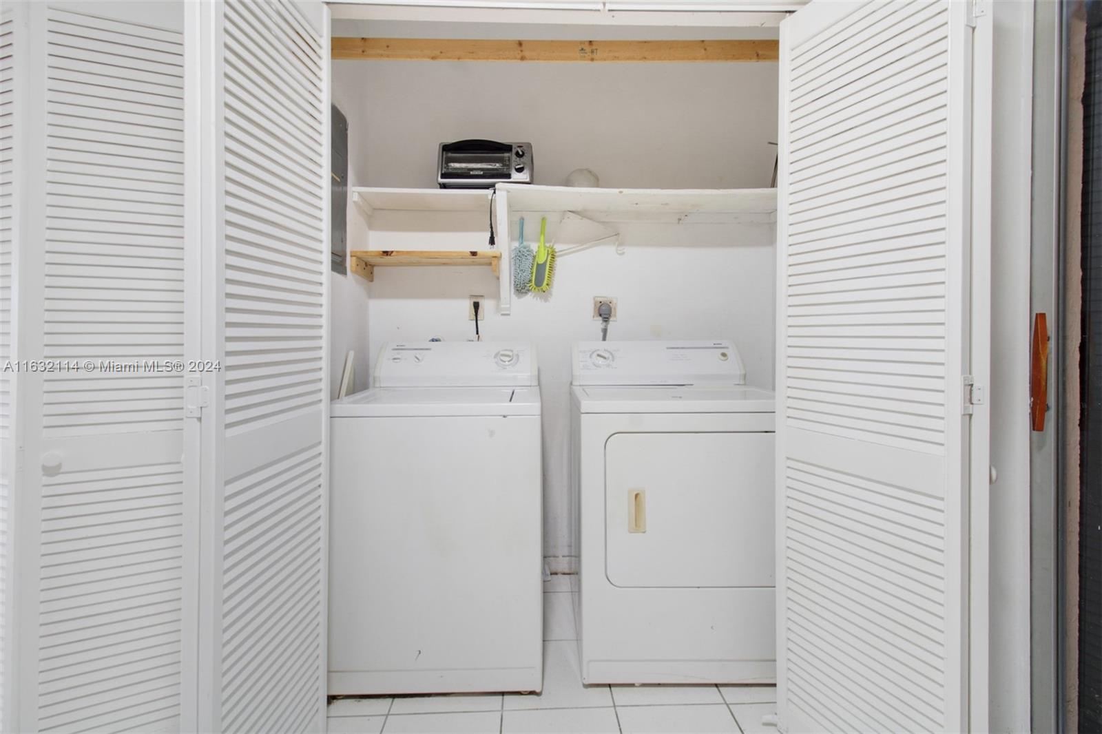 937 Michigan Avenue, Unit 4 Miami Beach, FL 33139 - Photo 12 of 20 a bathroom with a sink a toilet and shower
