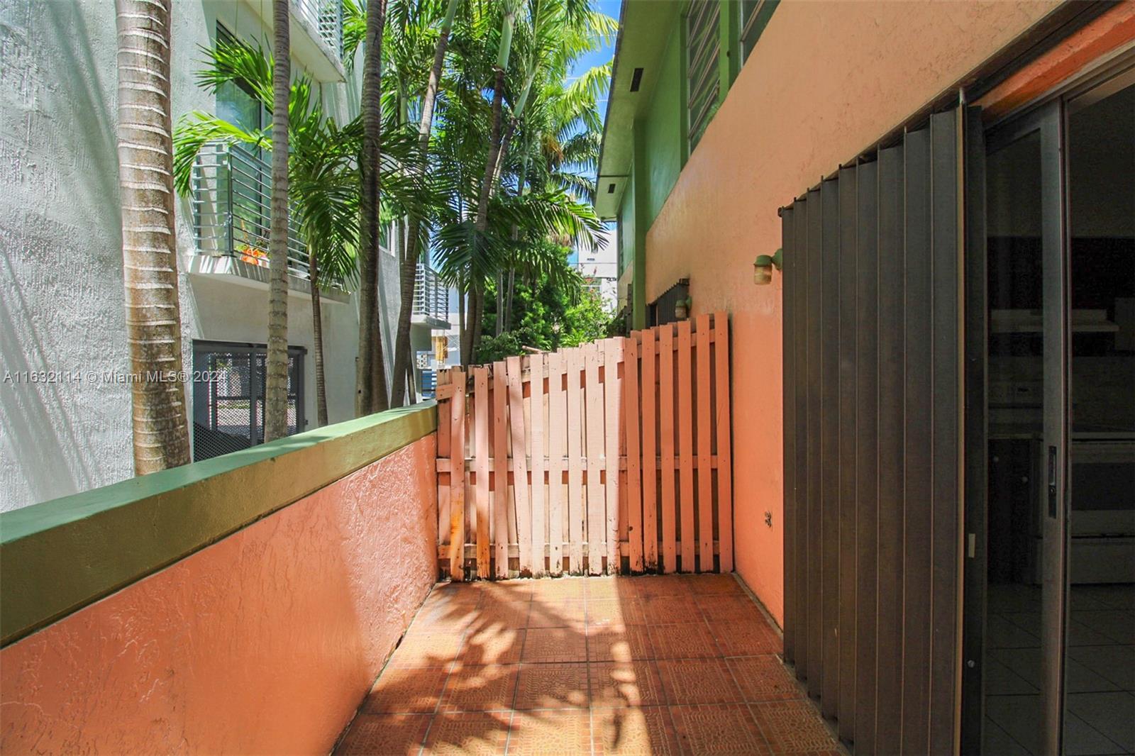 937 Michigan Avenue, Unit 4 Miami Beach, FL 33139 - Photo 14 of 20 a view of a house with a backyard