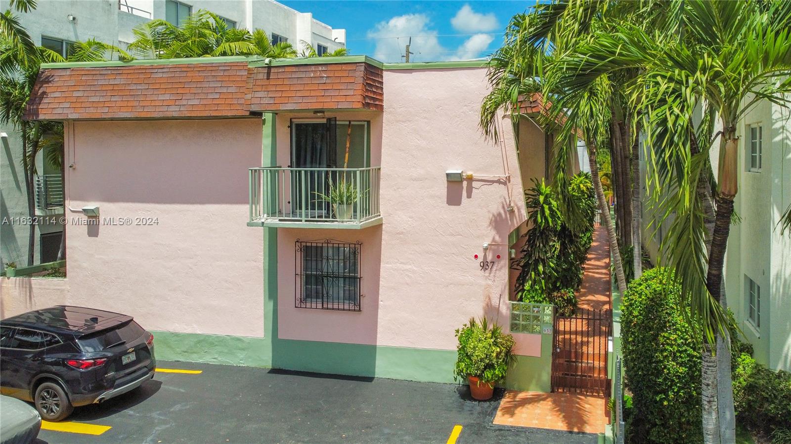 937 Michigan Avenue, Unit 4 Miami Beach, FL 33139 - Photo 16 of 20 a house view with a garden space