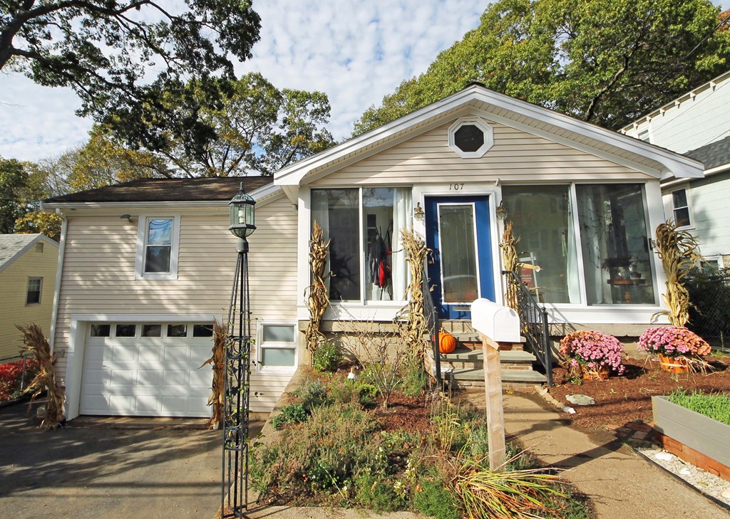107 Edgemont Road Braintree, MA 02184 - Photo 1 of 15 a front view of a house with garden