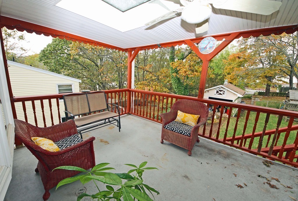 107 Edgemont Road Braintree, MA 02184 - Photo 12 of 15 a view of a two chairs in the balcony