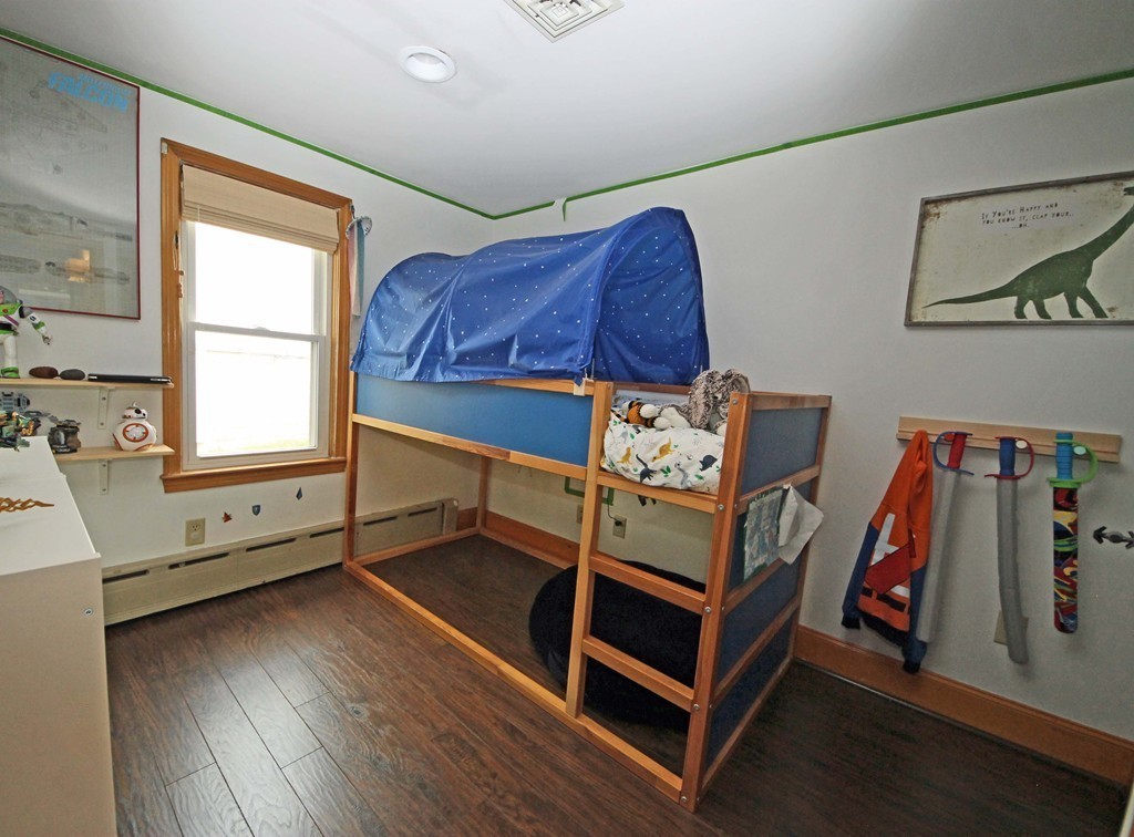 107 Edgemont Road Braintree, MA 02184 - Photo 8 of 15 a bedroom with furniture and a window