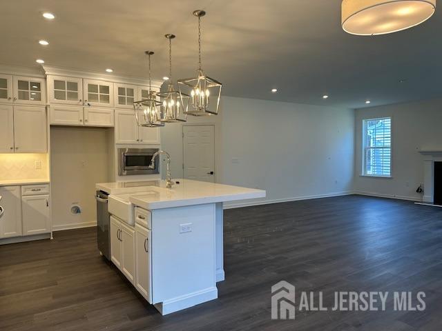 2 Aster Circle Old Bridge, NJ 08857 - Photo 14 of 60 a kitchen that has a lot of cabinets in it