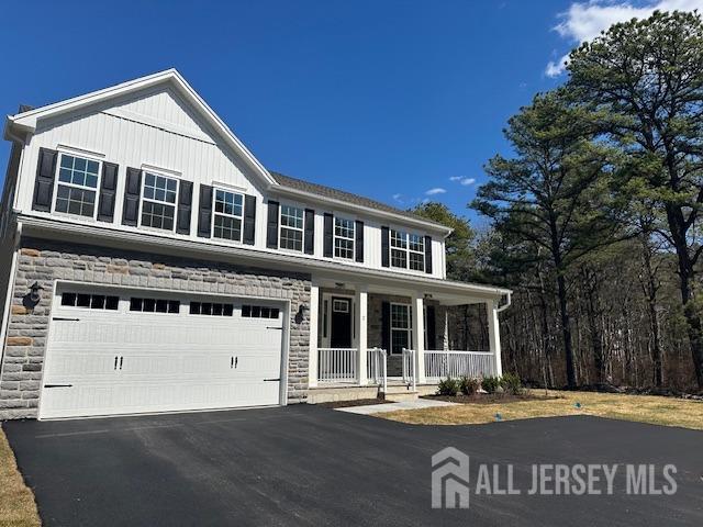 2 Aster Circle Old Bridge, NJ 08857 - Photo 2 of 60 a front view of a building with a garden