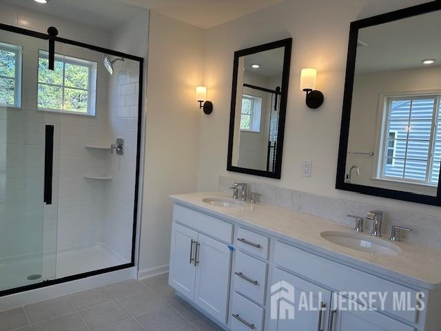 2 Aster Circle Old Bridge, NJ 08857 - Photo 28 of 60 a bathroom with a double vanity sink and mirror