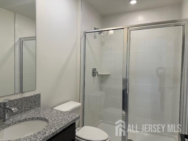 2 Aster Circle Old Bridge, NJ 08857 - Photo 39 of 60 a bathroom with a granite countertop sink toilet and shower