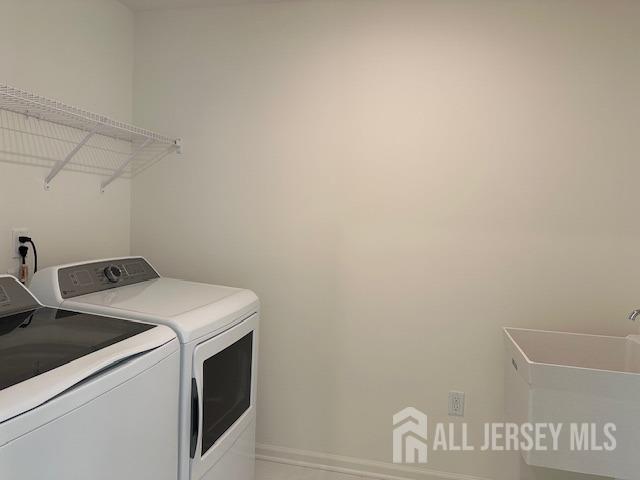 2 Aster Circle Old Bridge, NJ 08857 - Photo 44 of 60 a utility room with dryer and washer
