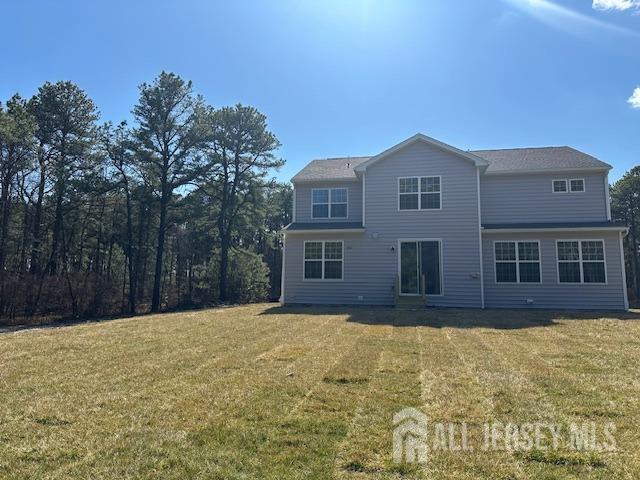 2 Aster Circle Old Bridge, NJ 08857 - Photo 53 of 60 a front view of house with yard and trees in the background