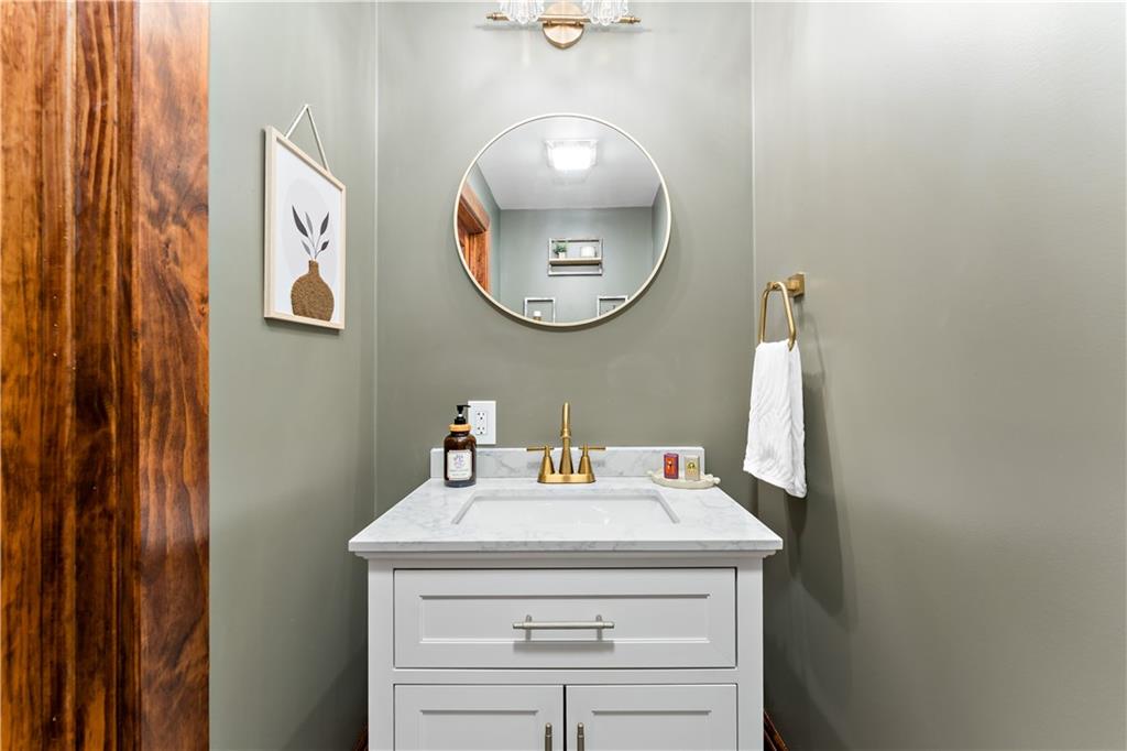 45 Redstone Lane Washington, PA 15301 - Photo 13 of 41 a bathroom with a sink and a mirror