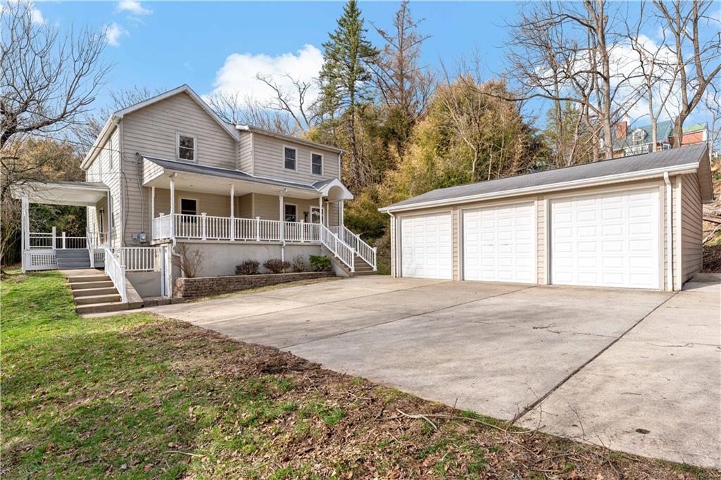 45 Redstone Lane Washington, PA 15301 - Photo 2 of 41 a view of a house with a yard and large tree
