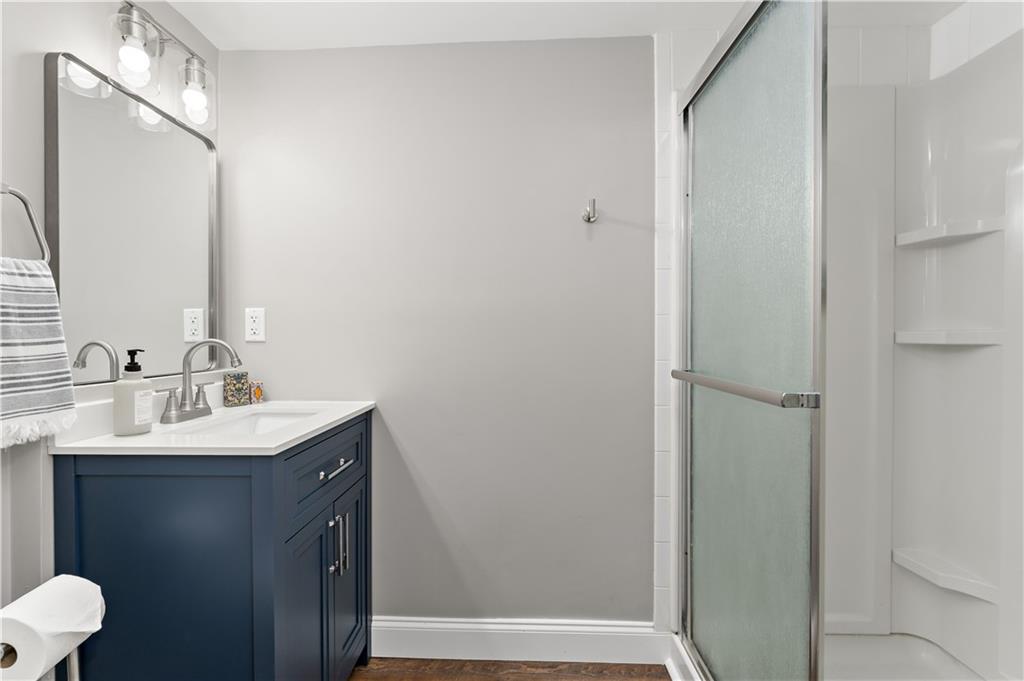 45 Redstone Lane Washington, PA 15301 - Photo 33 of 41 a bathroom with a sink and a mirror