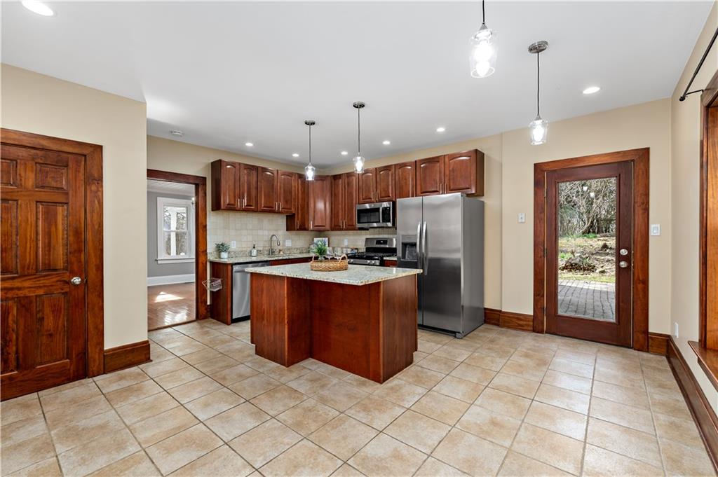45 Redstone Lane Washington, PA 15301 - Photo 6 of 41 a kitchen with stainless steel appliances granite countertop a refrigerator and a sink