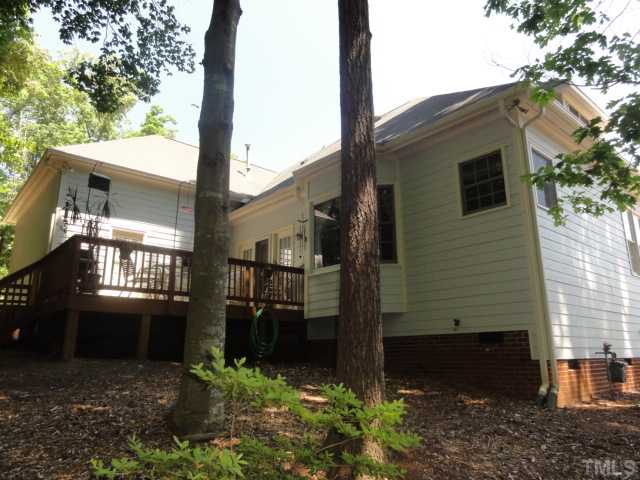 3425 Savan Court Raleigh, NC 27613 - Photo 21 of 25 a view of a house with a yard