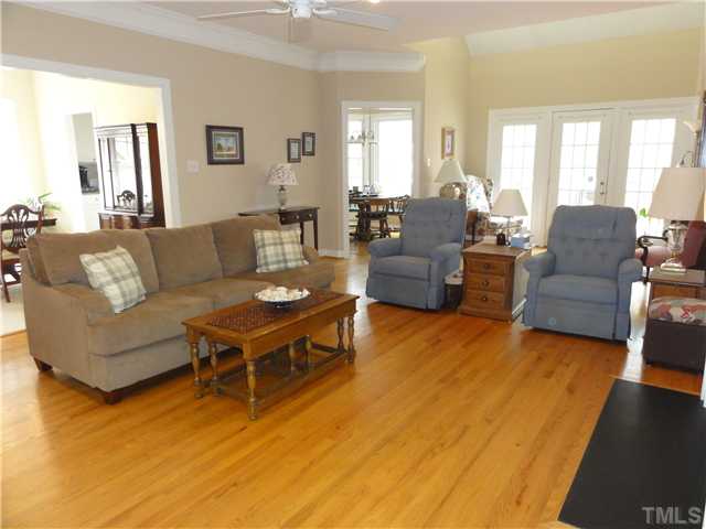 3425 Savan Court Raleigh, NC 27613 - Photo 5 of 25 a living room with furniture and a table