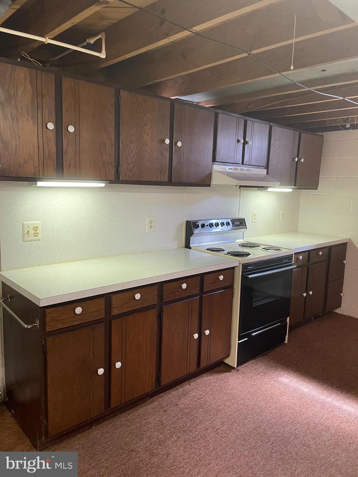 1670 Florence Road Mount Airy, MD 21771 - Photo 20 of 20 a kitchen with a cabinets and white appliances
