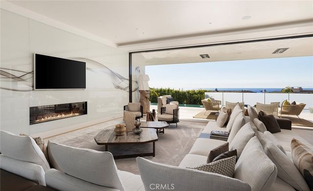 a spacious bedroom with a bed and a couch