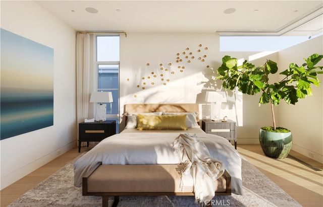 a bed room with a bed and a lamp