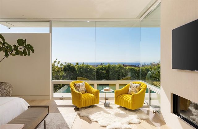 a bedroom with bed and a window