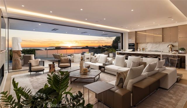 a very nice looking kitchen with a large window