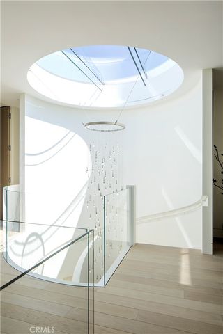 a room with gym equipment and a view of living room