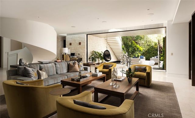 a view of a chairs and table in a room