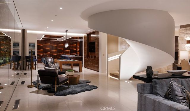 a view of a hallway with seating area