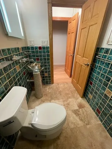a bathroom with a sink and toilet