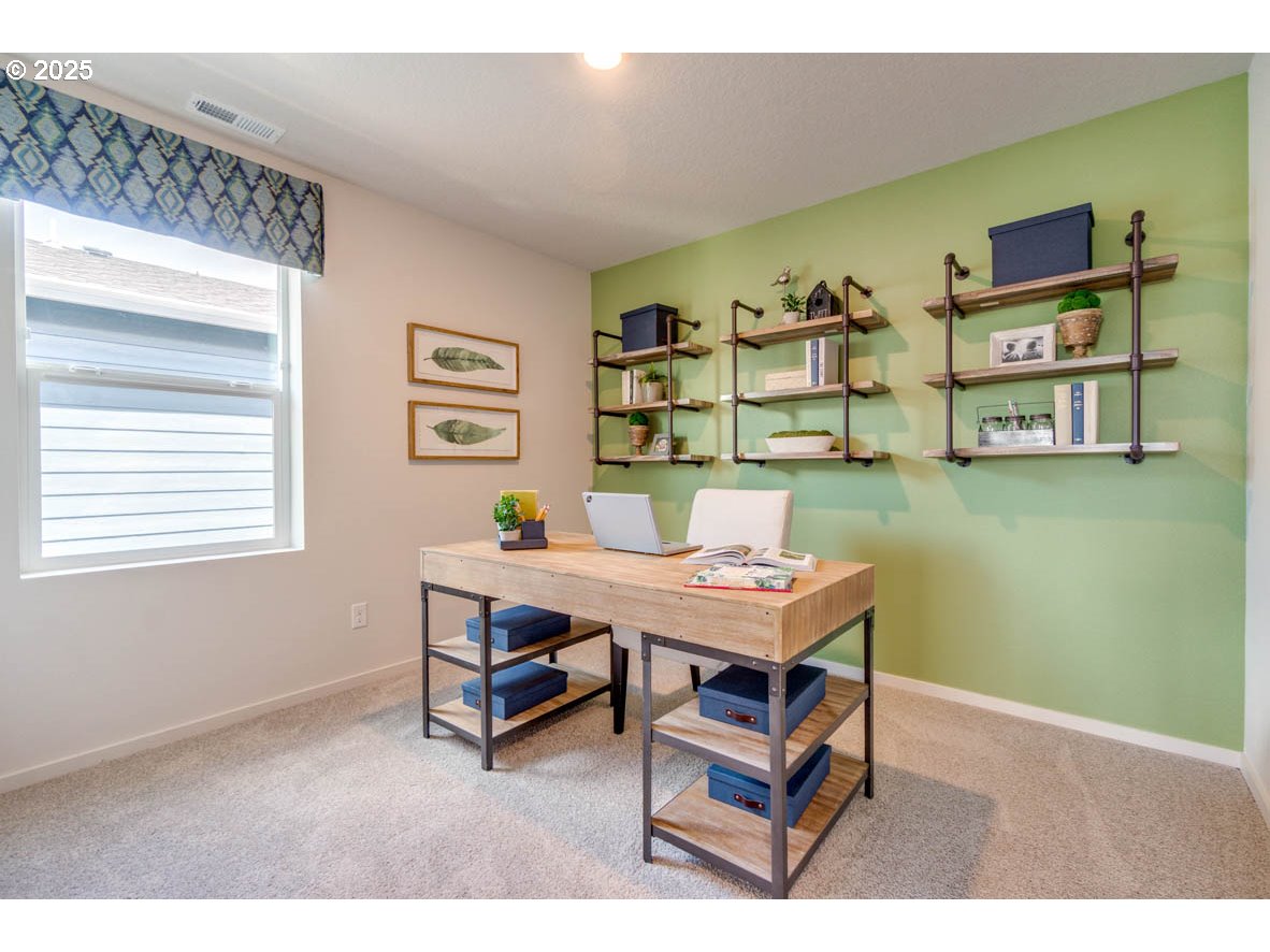 2996 U Street Springfield, OR 97477 - Photo 13 of 21 a view of a workspace with furniture