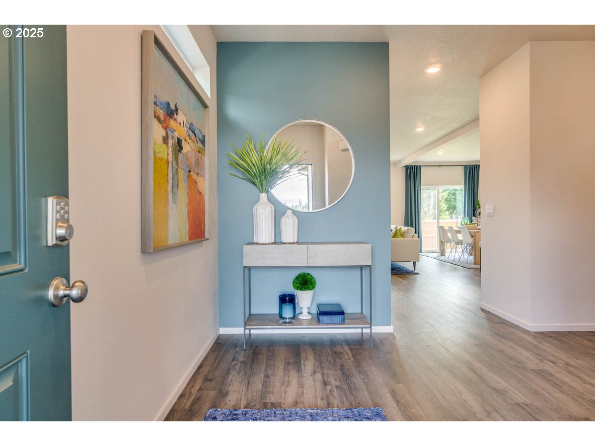 2996 U Street Springfield, OR 97477 - Photo 2 of 21 a view of living room with furniture and wooden floor