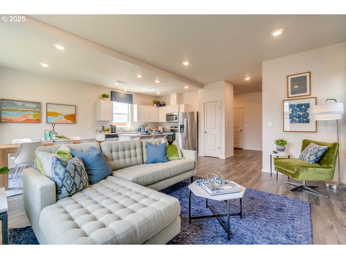 2996 U Street Springfield, OR 97477 - Photo 6 of 21 a living room with furniture and kitchen view